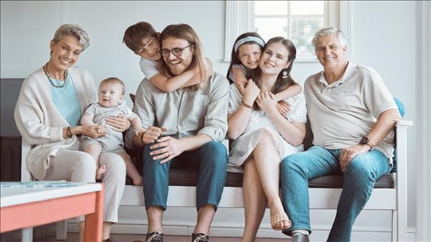 Family at home representing community-focused housing